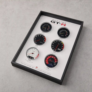 Nissan Skyline GT-R Tachometer Evolution 3D Framed Display — flat lay on grey concrete showing all six tachometer faces