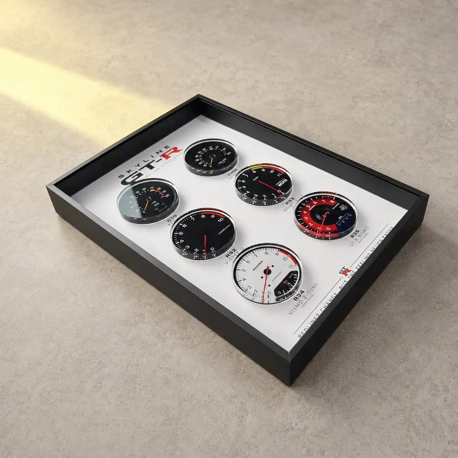 Nissan Skyline GT-R Tachometer Evolution 3D Framed Display — warm directional lighting revealing the depth between layers